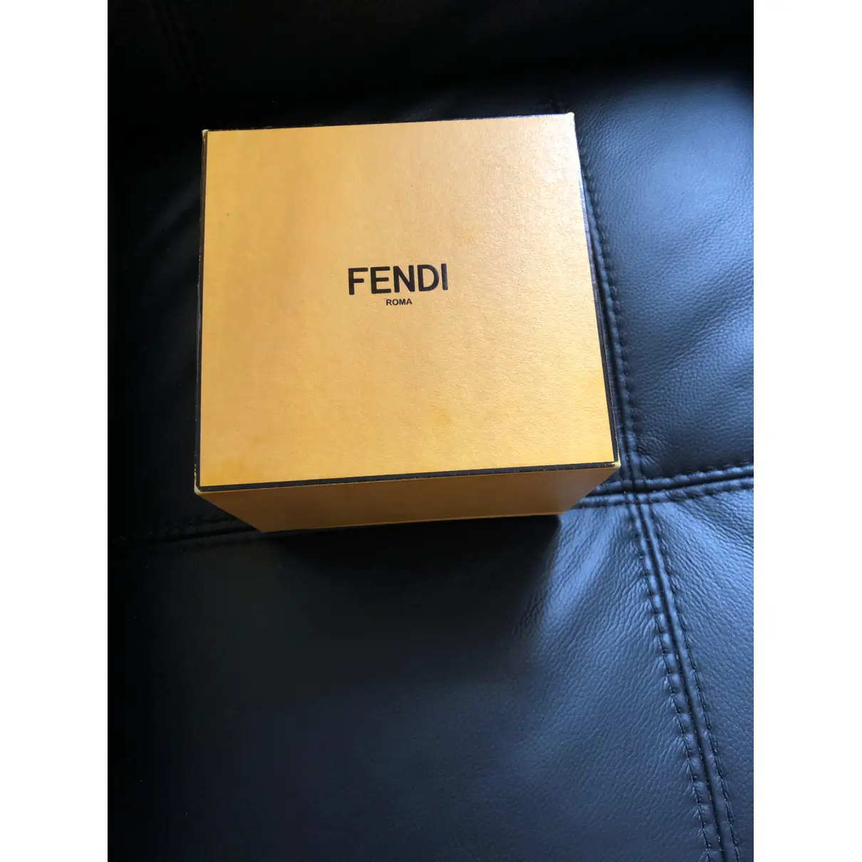 F is Fendi leather earrings Fendi