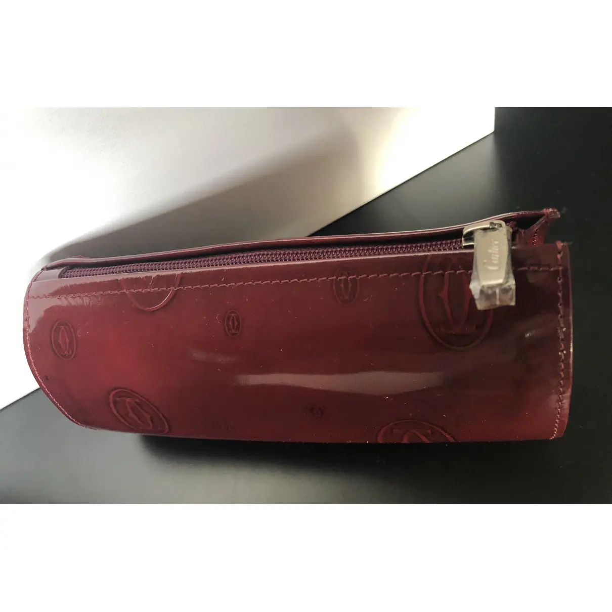 Patent leather travel bag Cartier