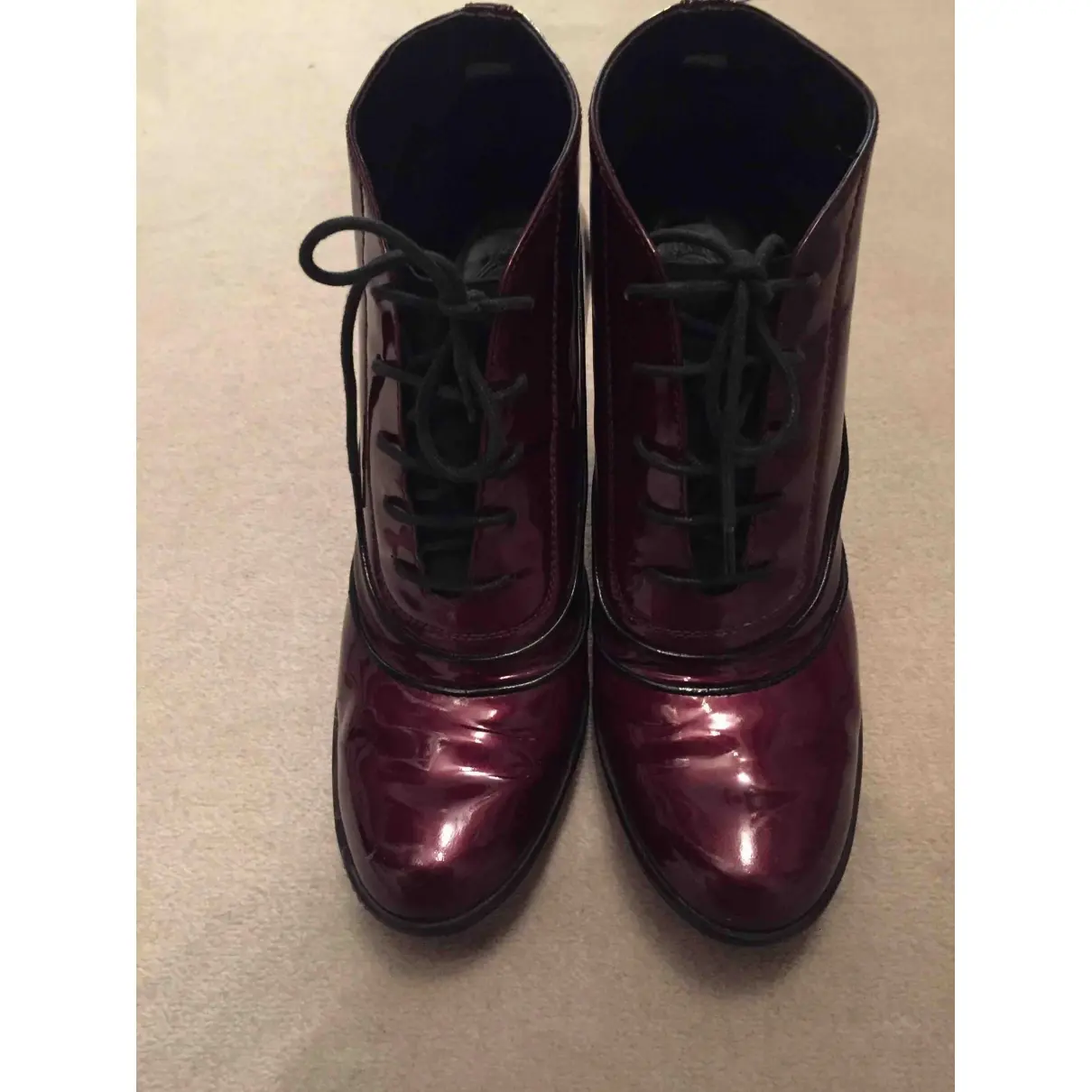 Buy Tod's Patent leather lace up boots online