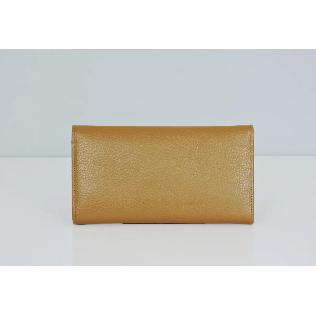 Buy Tod's Leather clutch bag online
