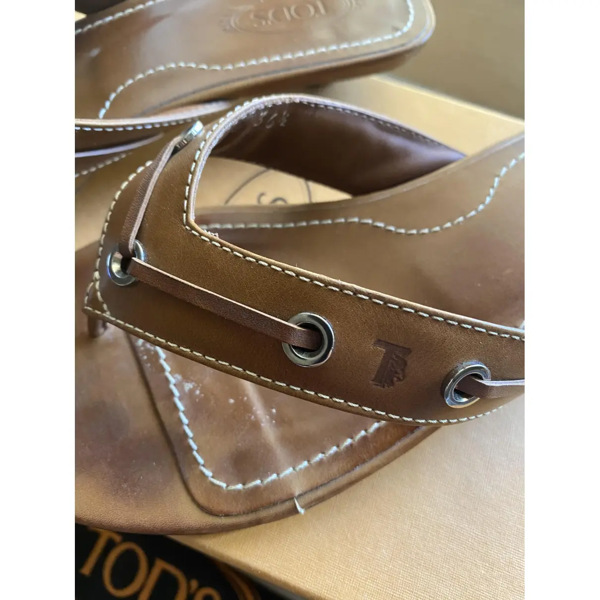 Buy Tod's Leather flip flops online