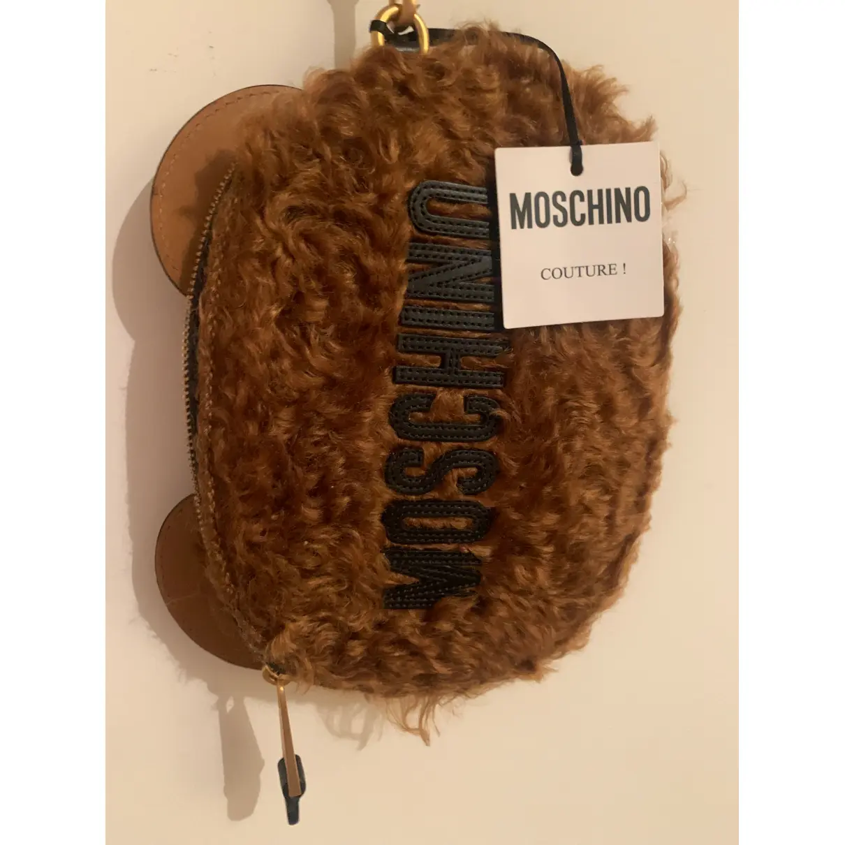 Mongolian lamb clutch bag Moschino