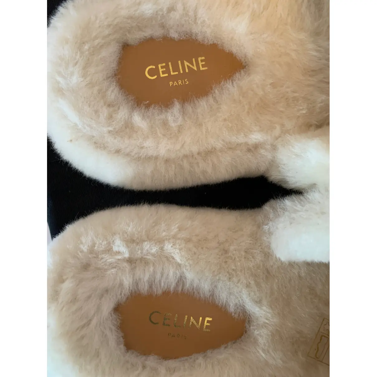 Buy Celine Triomphe shearling mules online