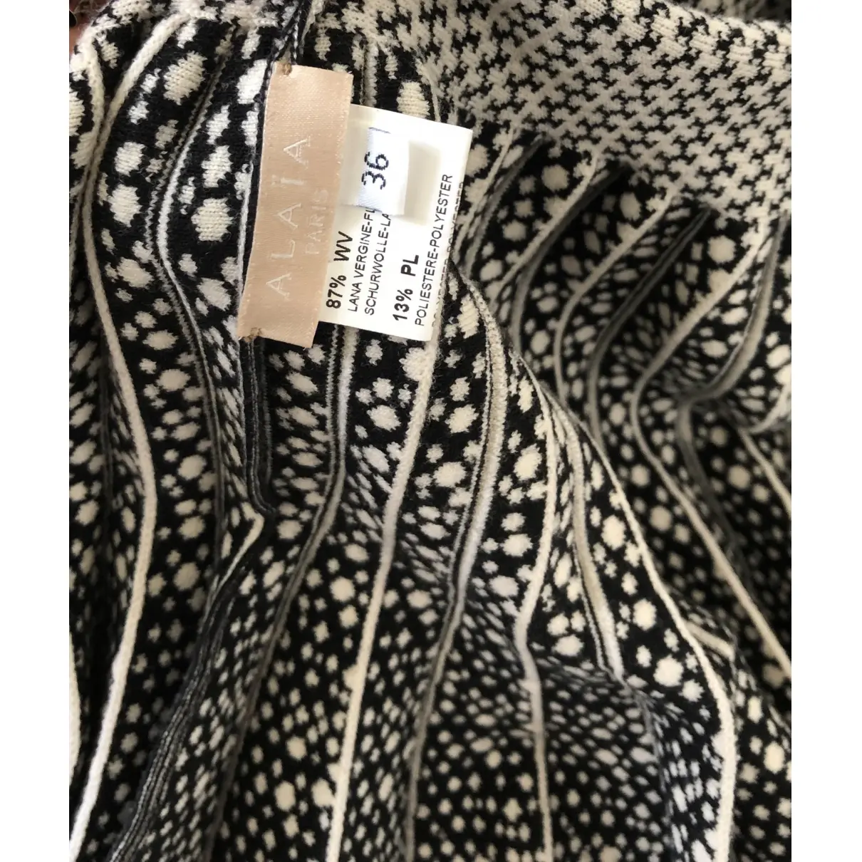 Buy Alaïa Wool mid-length dress online