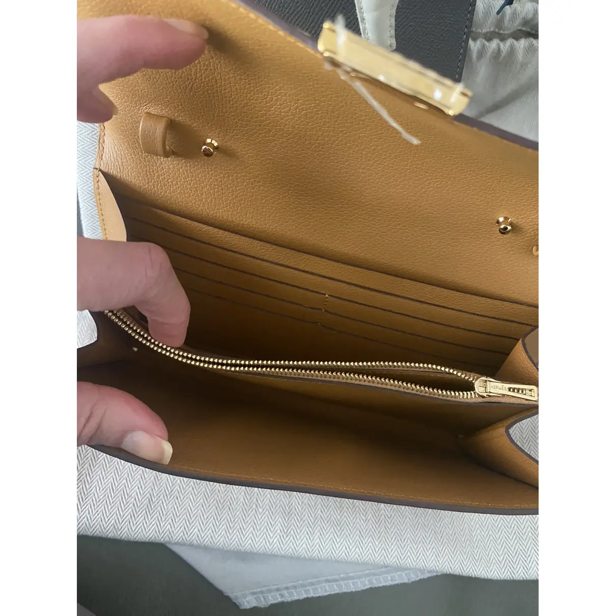 Kelly to go leather clutch bag Hermès