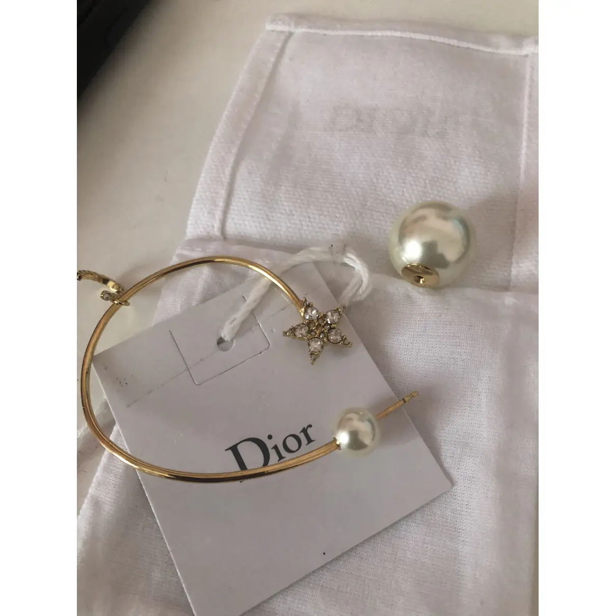 Tribal earrings Dior