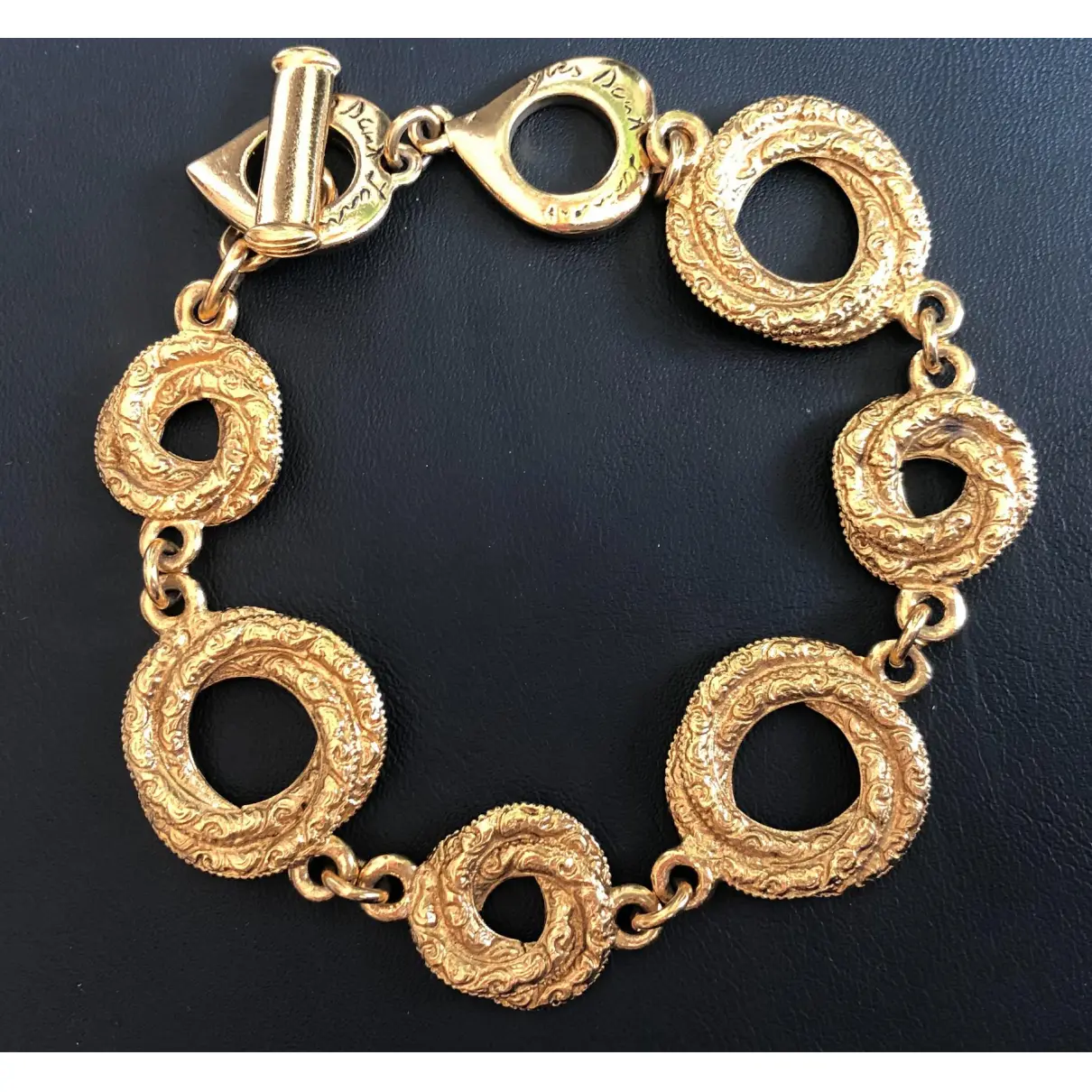 Buy Yves Saint Laurent Gold Metal Bracelet online - Vintage