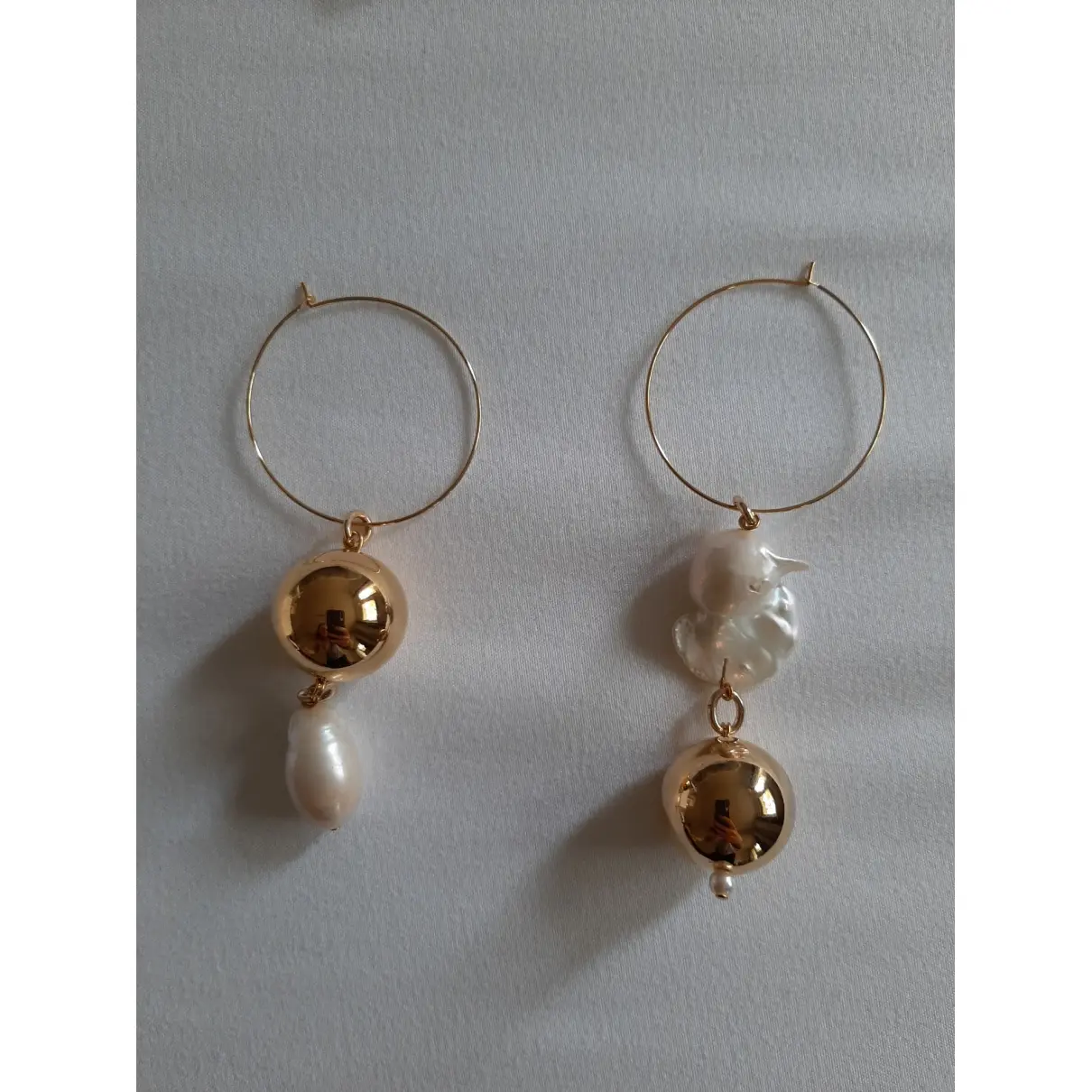 Buy Assad Mounser Pearl earrings online