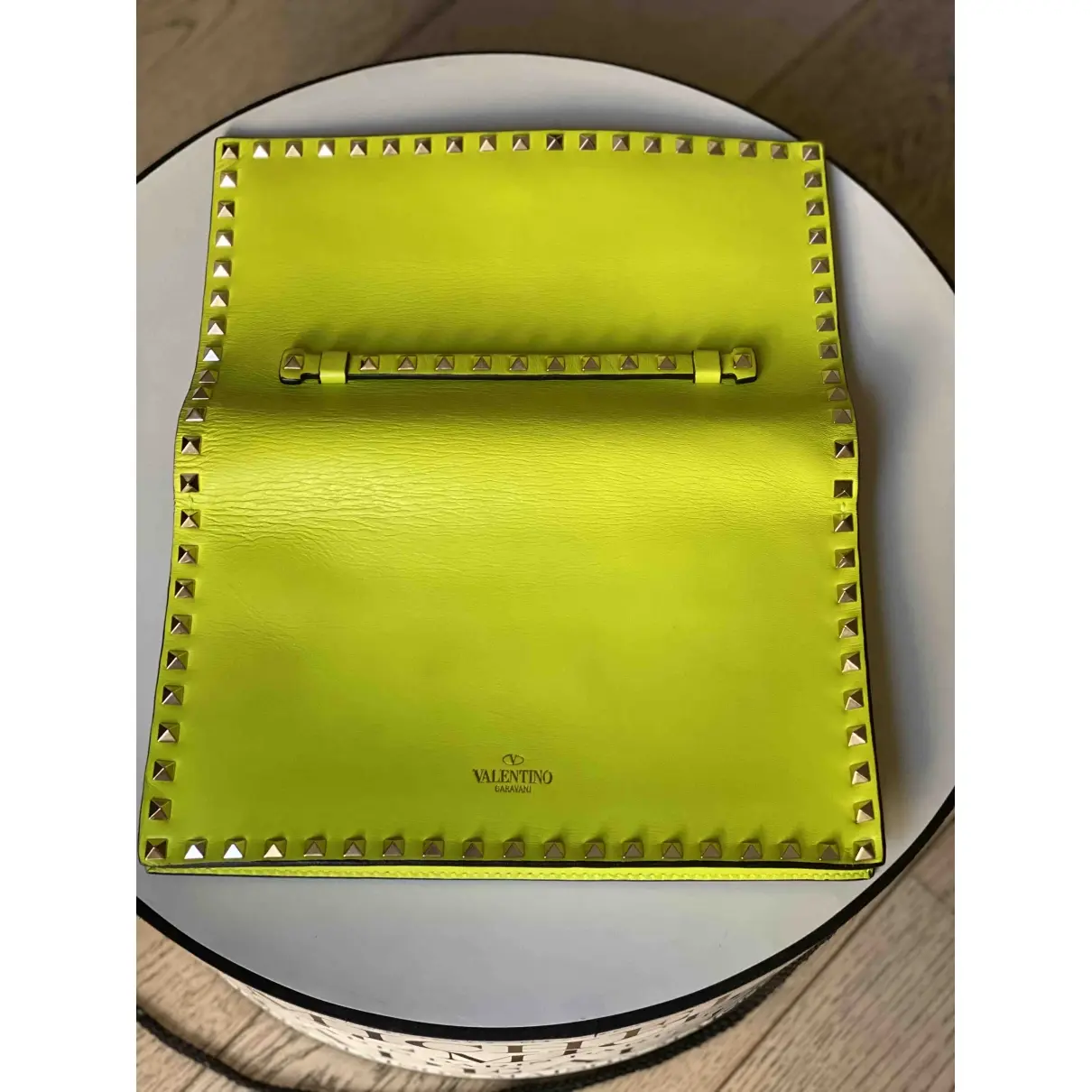 Buy Valentino Garavani Rockstud leather clutch bag online