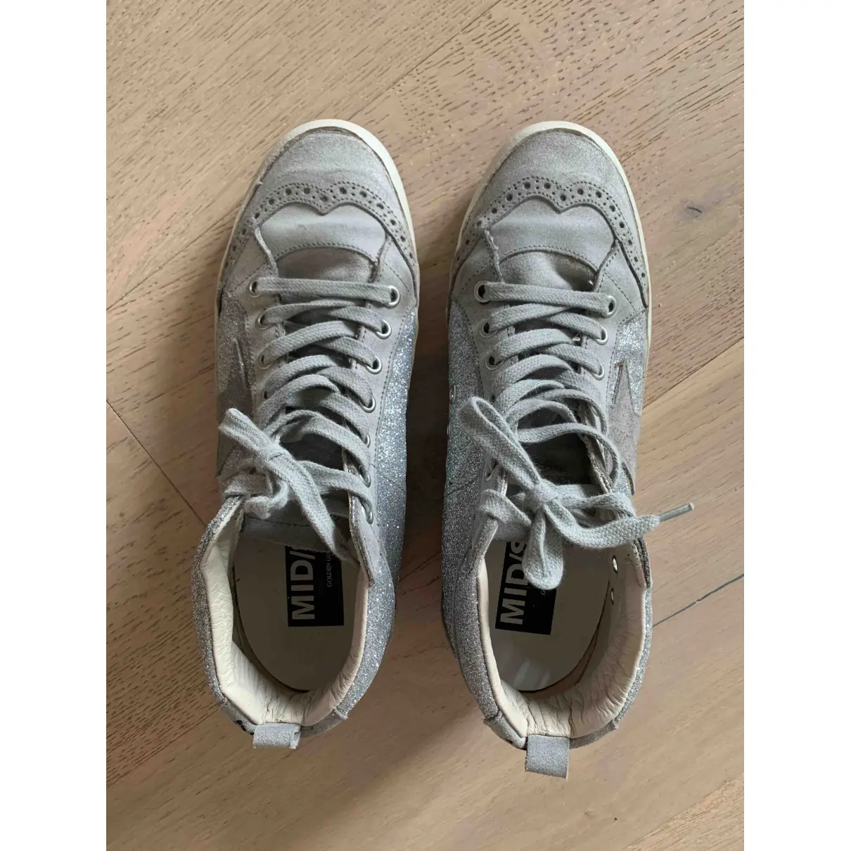 Buy Golden Goose Mid Star leather trainers online