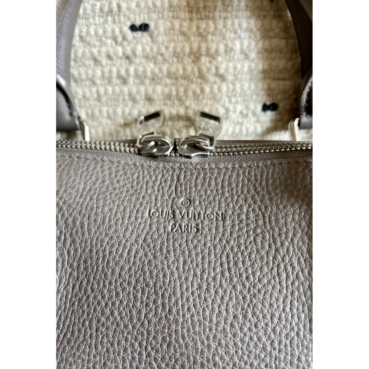Buy Louis Vuitton Naxos leather satchel online