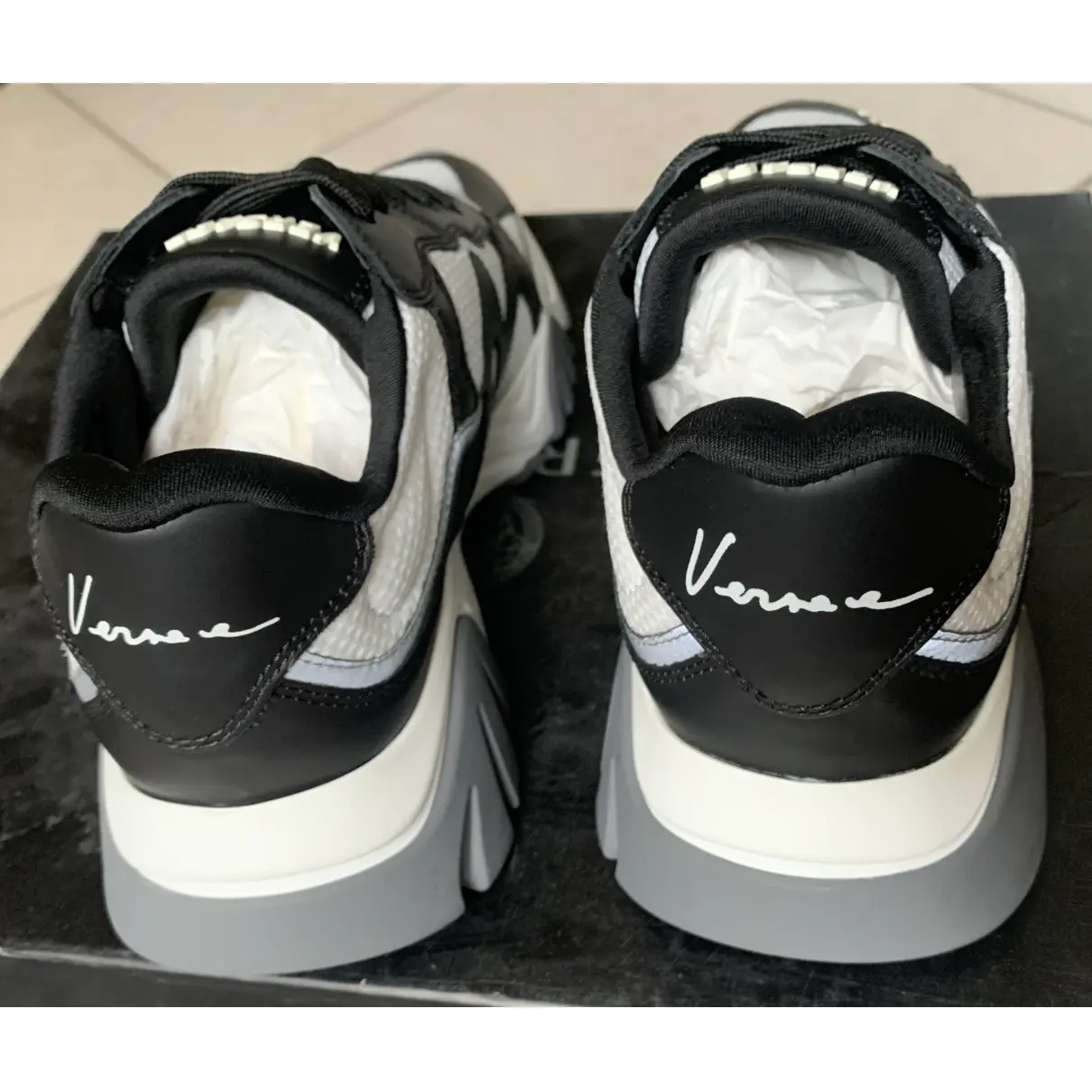 Buy Versace Squalo leather trainers online