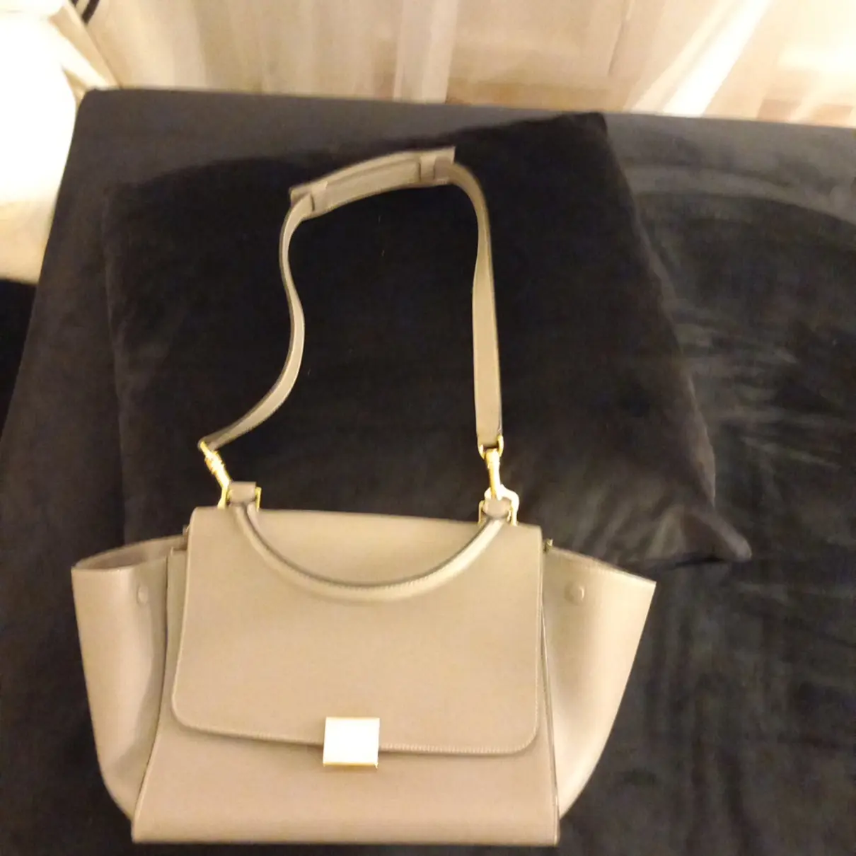 Buy Celine Trapèze leather clutch bag online