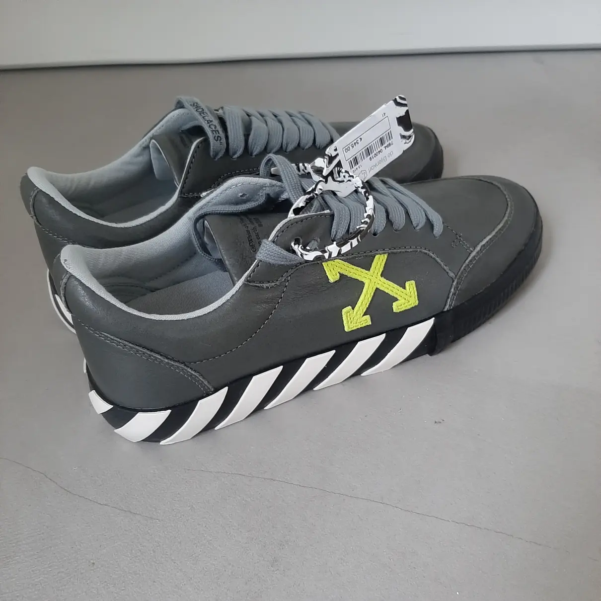Buy Off-White Vulcalized leather low trainers online