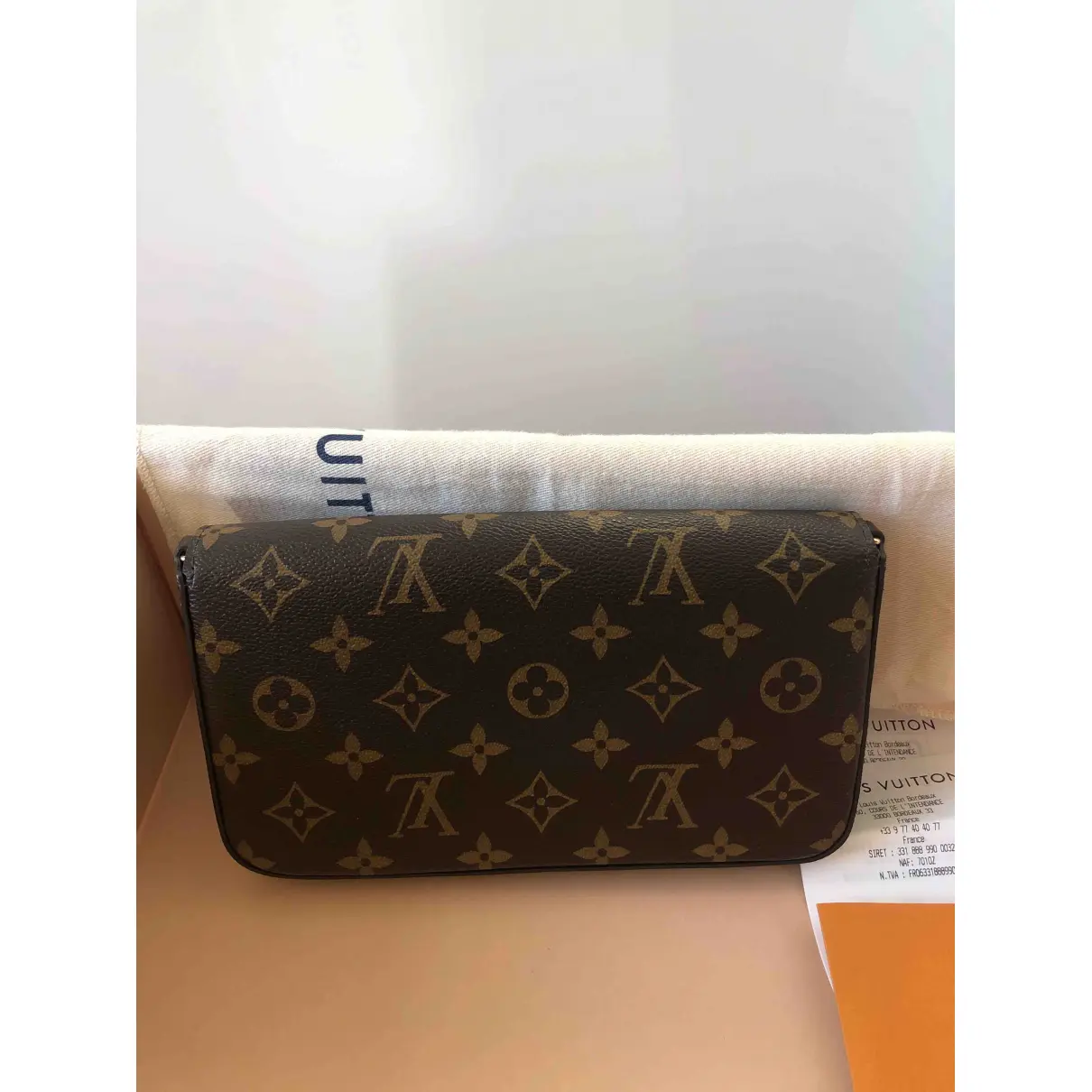 Buy Louis Vuitton Félicie cloth clutch bag online