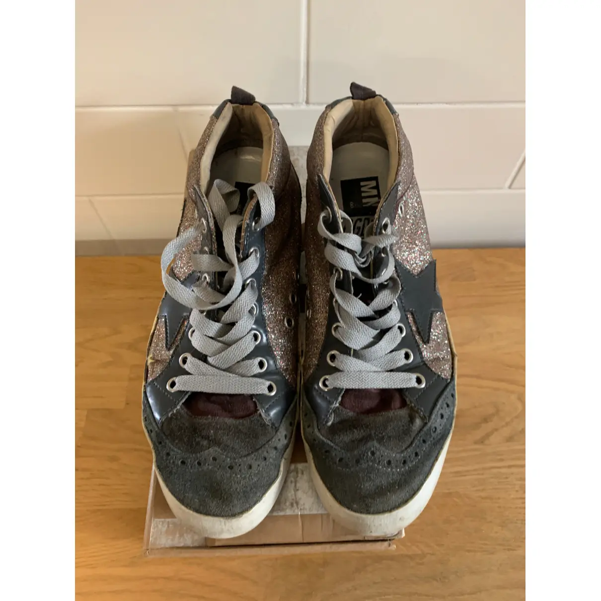 Buy Golden Goose Mid Star leather trainers online