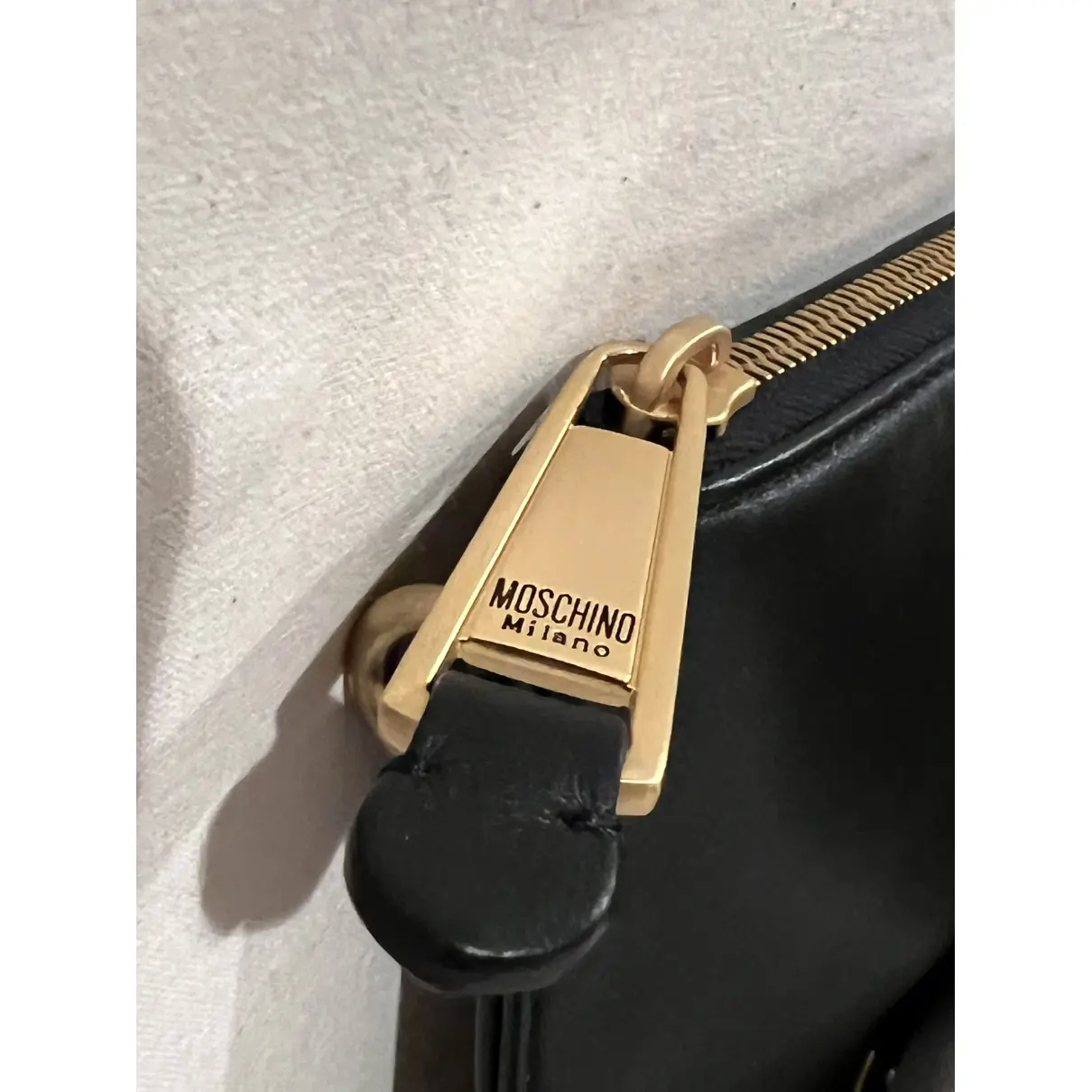 Leather clutch bag Moschino
