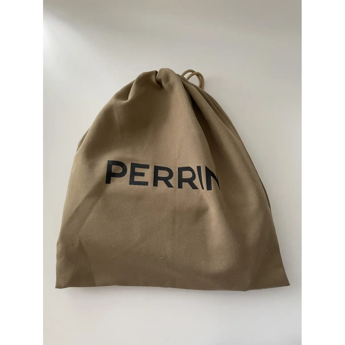 Buy Perrin Paris Leather clutch bag online