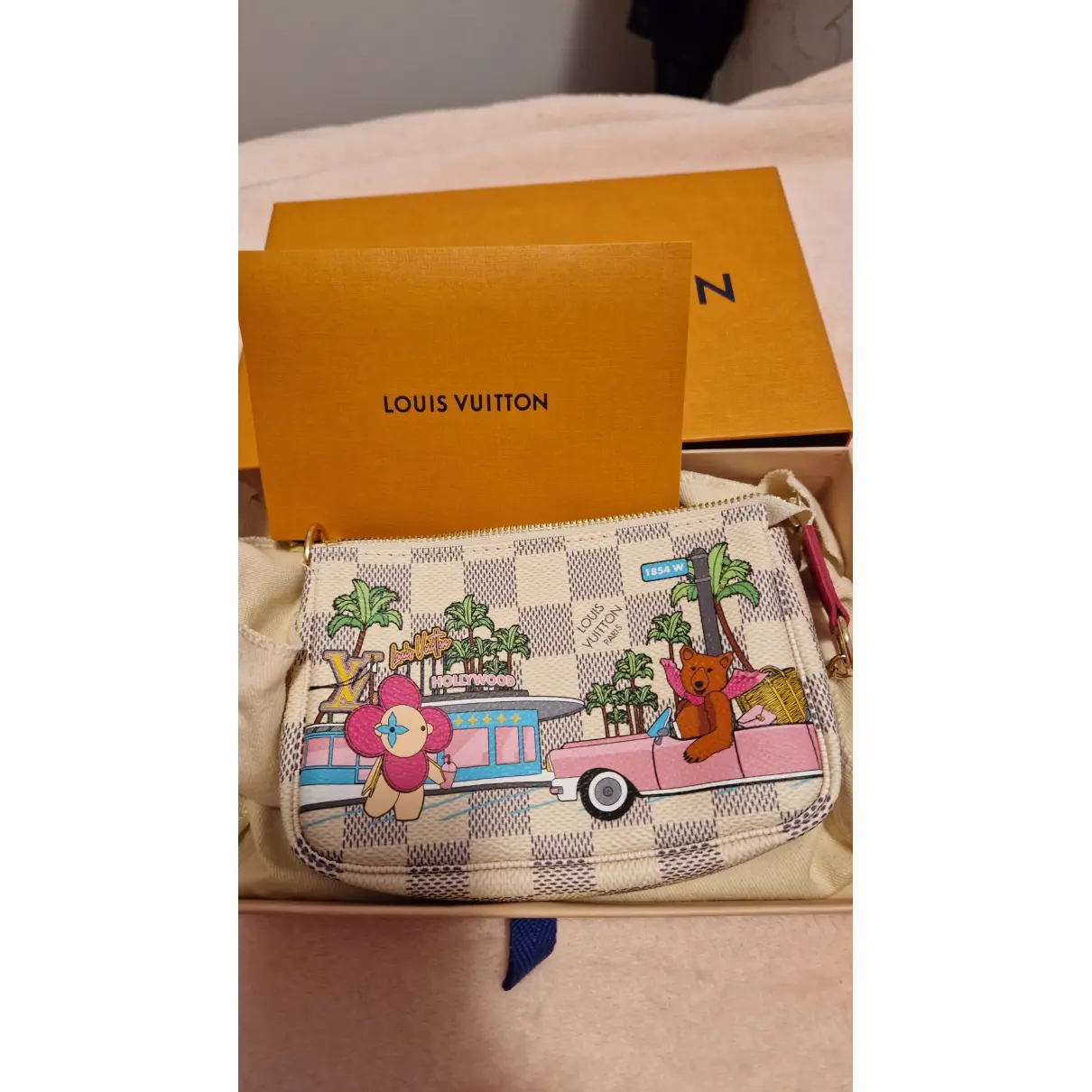 Buy Louis Vuitton Pochette Accessoire leather mini bag online