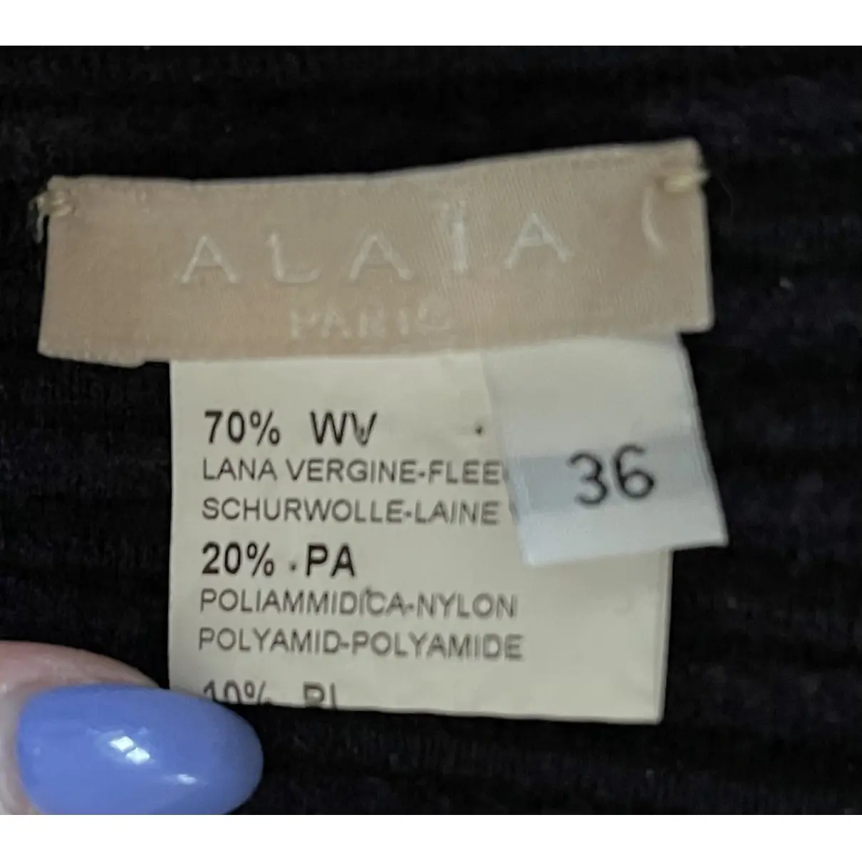Buy Alaïa Wool mid-length dress online