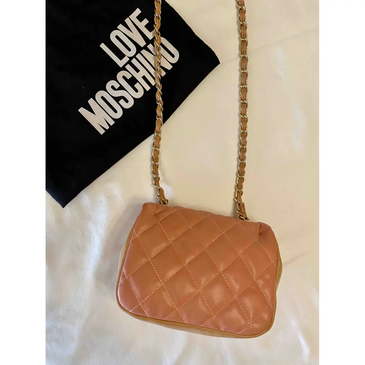 Buy Moschino Love Leather clutch bag online