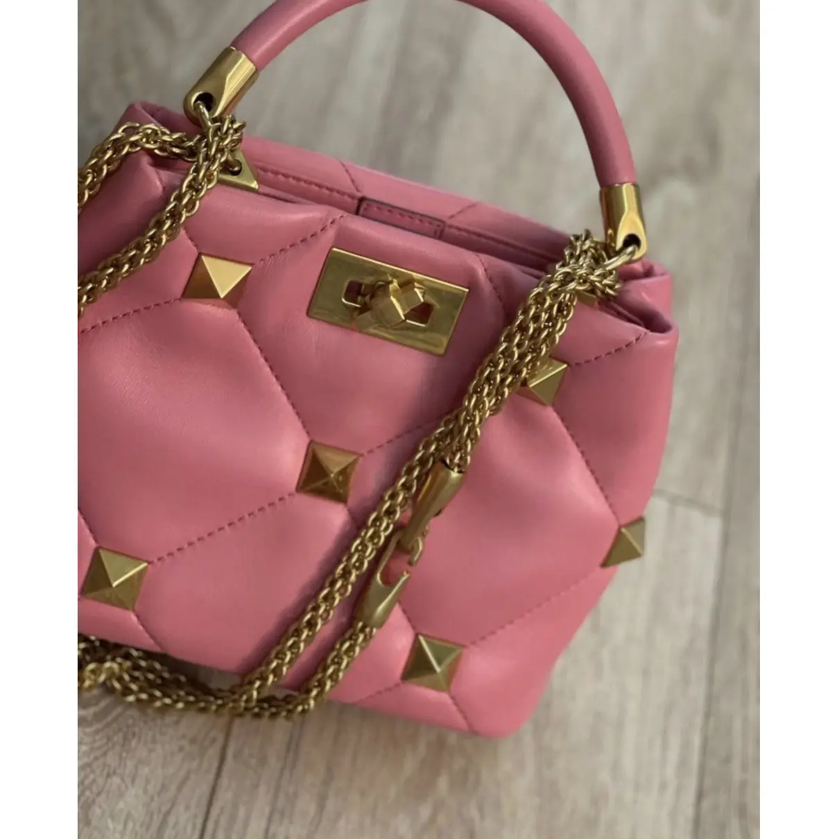 Buy Valentino Garavani Roman Stud leather handbag online