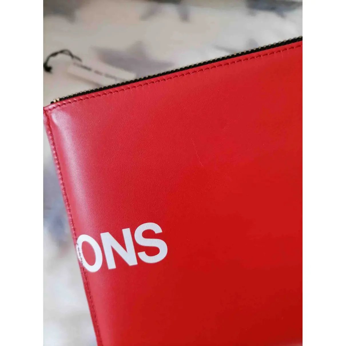 Buy Comme Des Garcons Leather clutch bag online