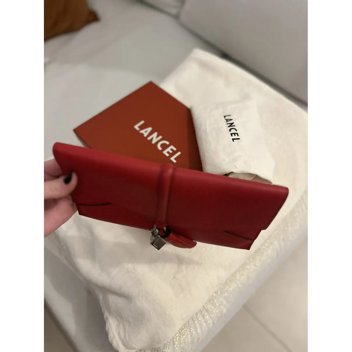 Buy Lancel Nine leather clutch bag online