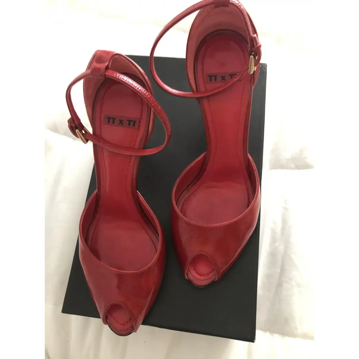 Buy Titti Dell'Acqua Patent leather heels online