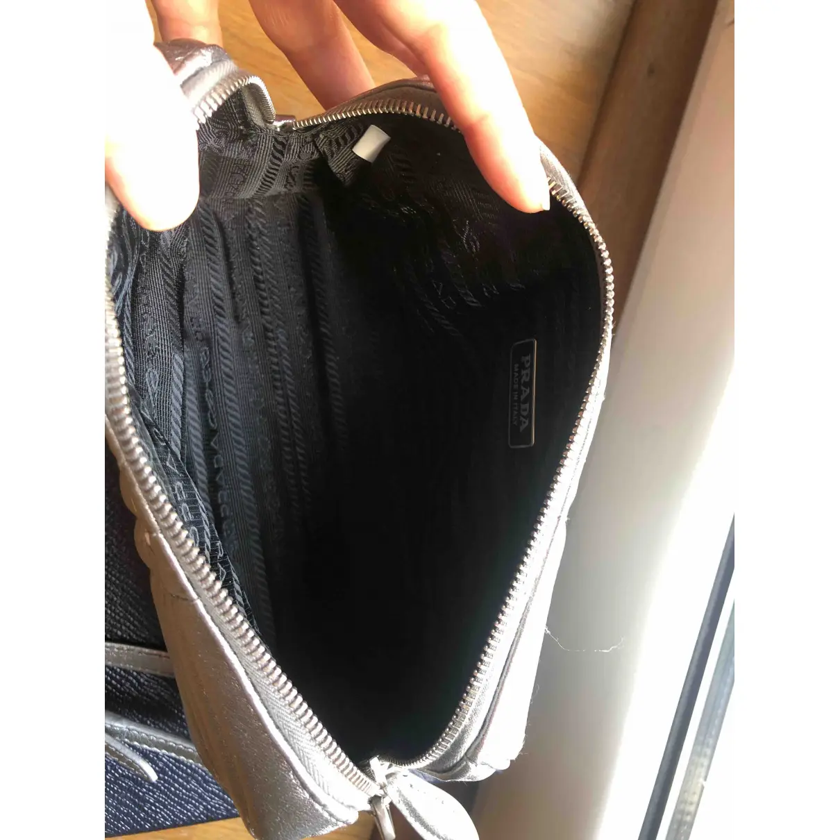 Diagramme leather clutch bag Prada