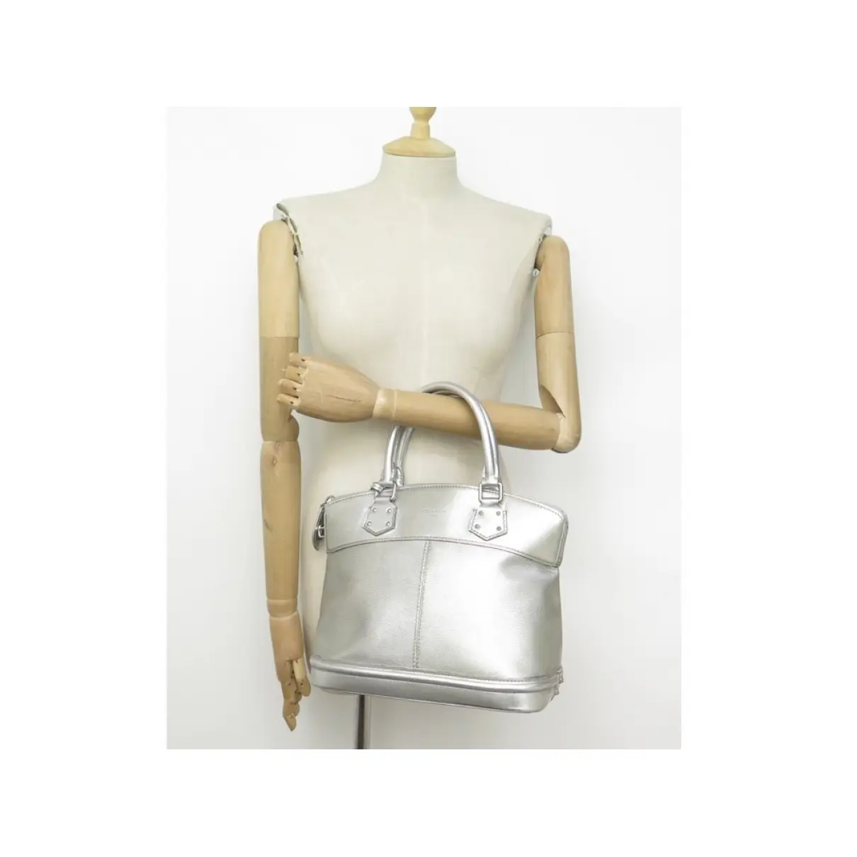 Buy Louis Vuitton Lockit leather handbag online