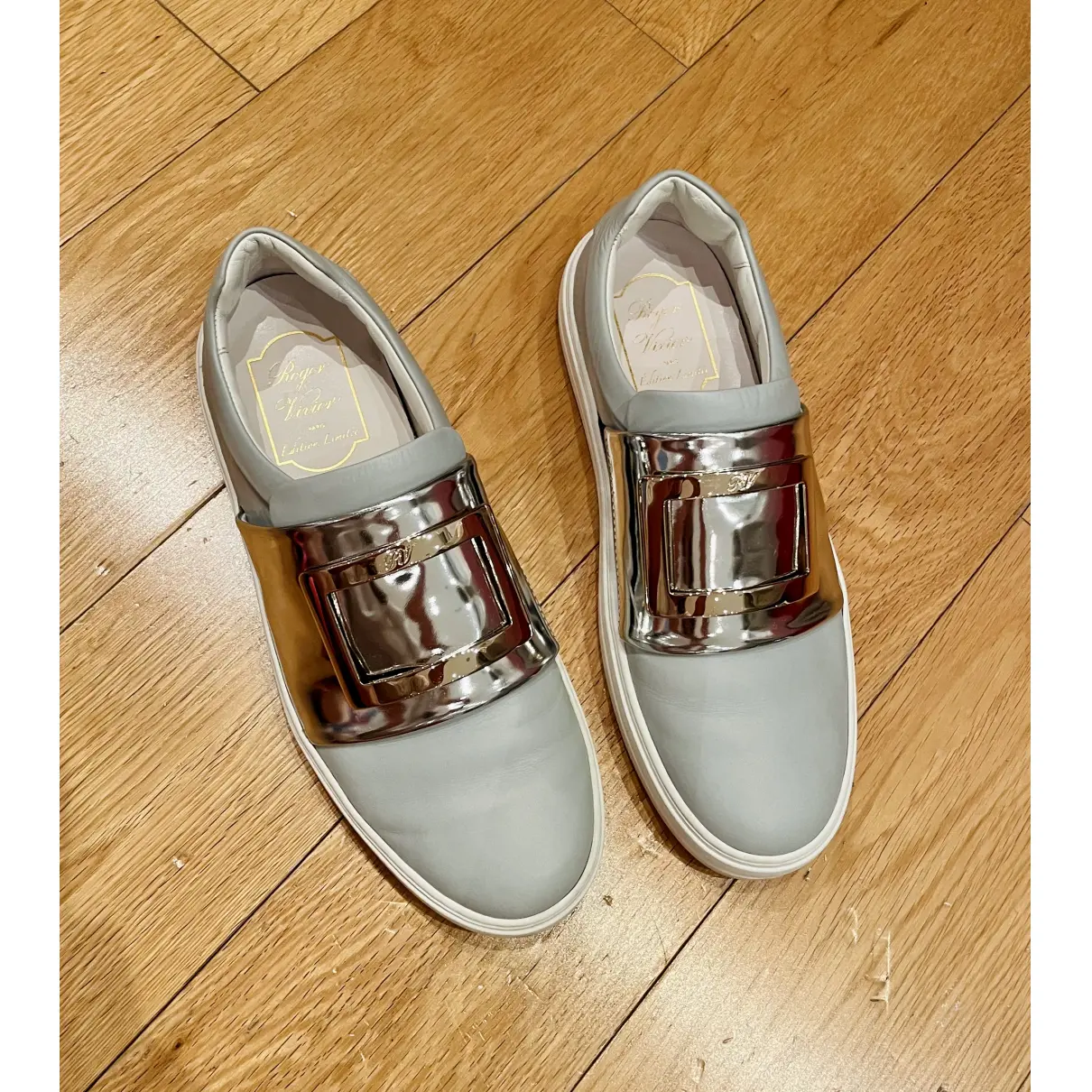 Buy Roger Vivier Sneaky Viv Strass Buckle leather trainers online