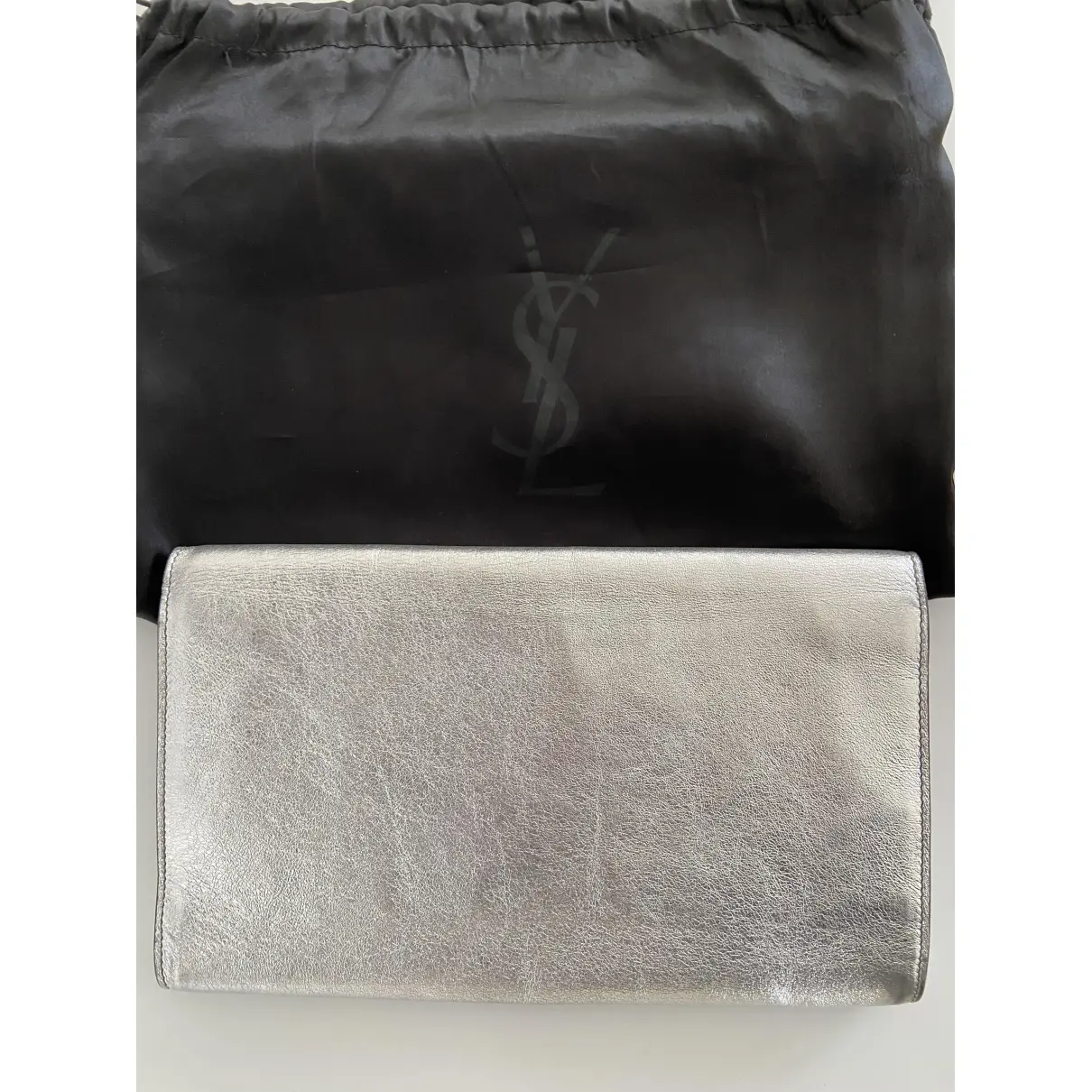 Buy Yves Saint Laurent Belle de Jour patent leather clutch bag online