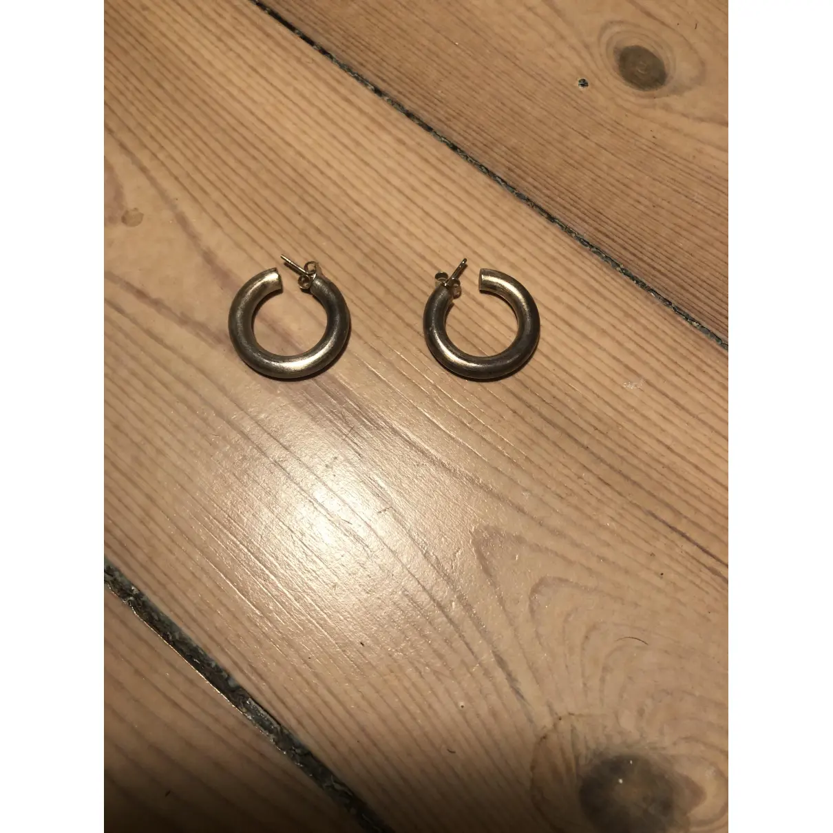 Buy Jane Koenig Silver earrings online