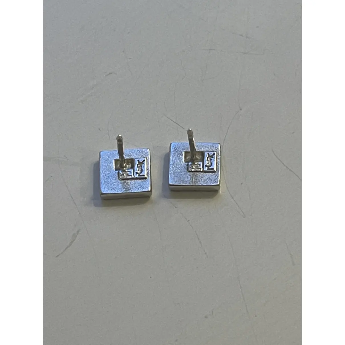 Buy Yves Saint Laurent Silver earrings online
