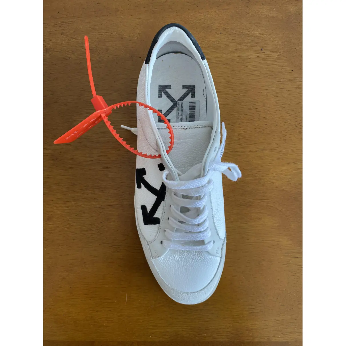 Buy Off-White Arrow leather low trainers online