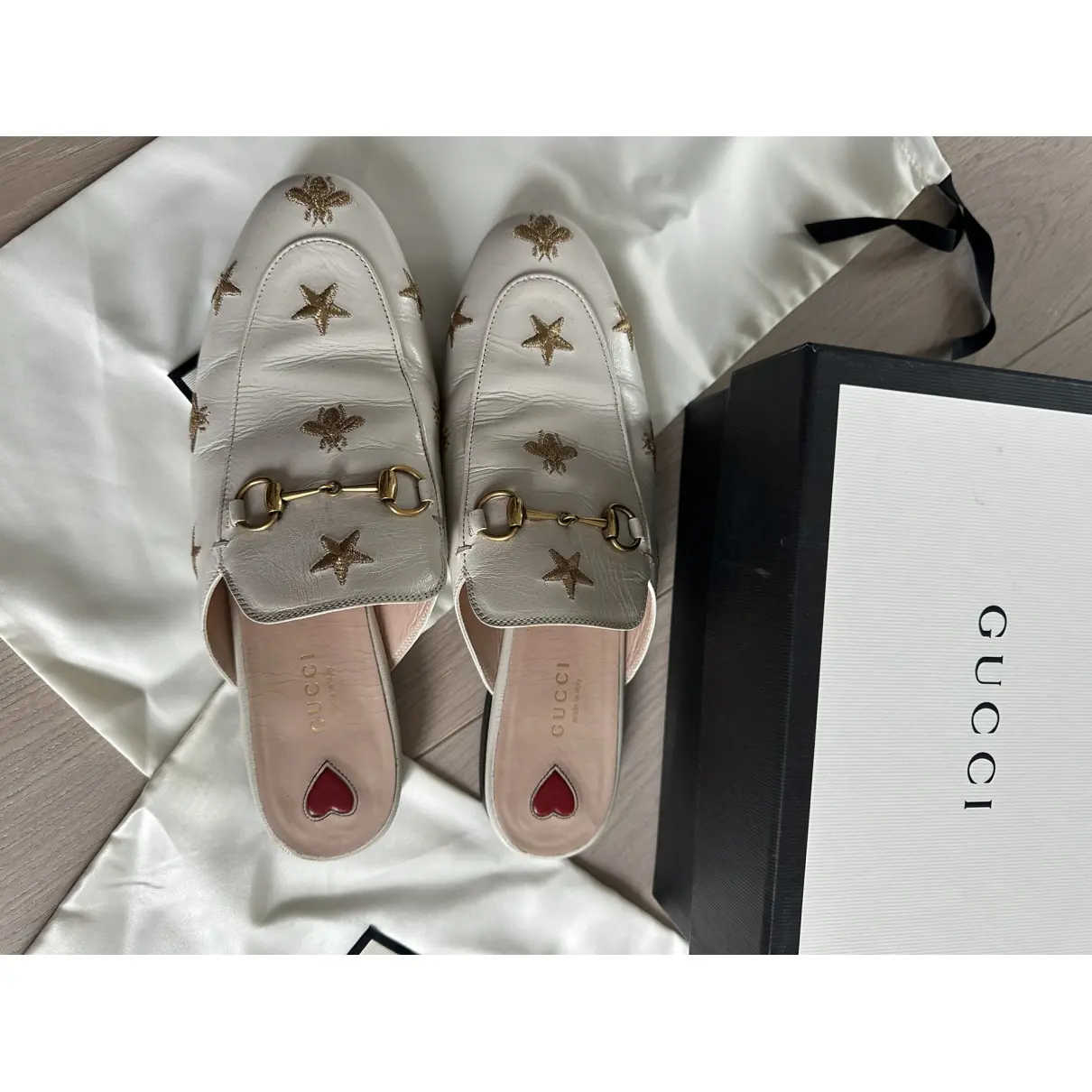 Buy Gucci Leather mules & clogs online