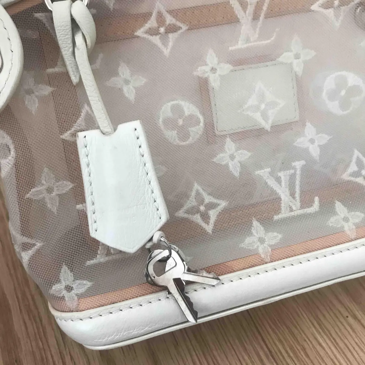 Buy Louis Vuitton Lockit leather clutch bag online