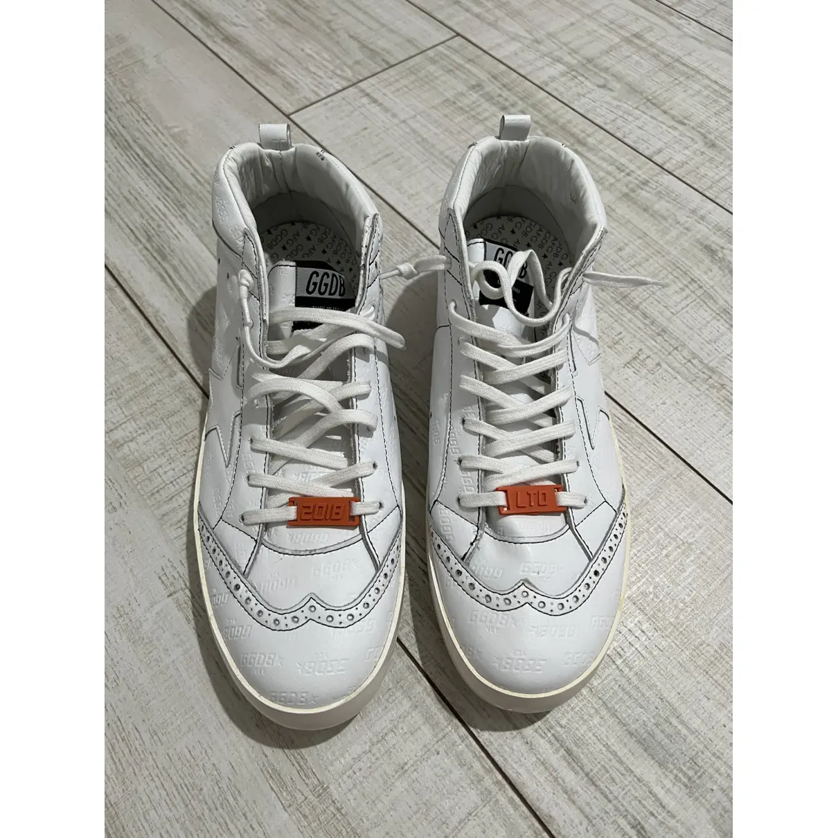 Buy Golden Goose Mid Star leather high trainers online