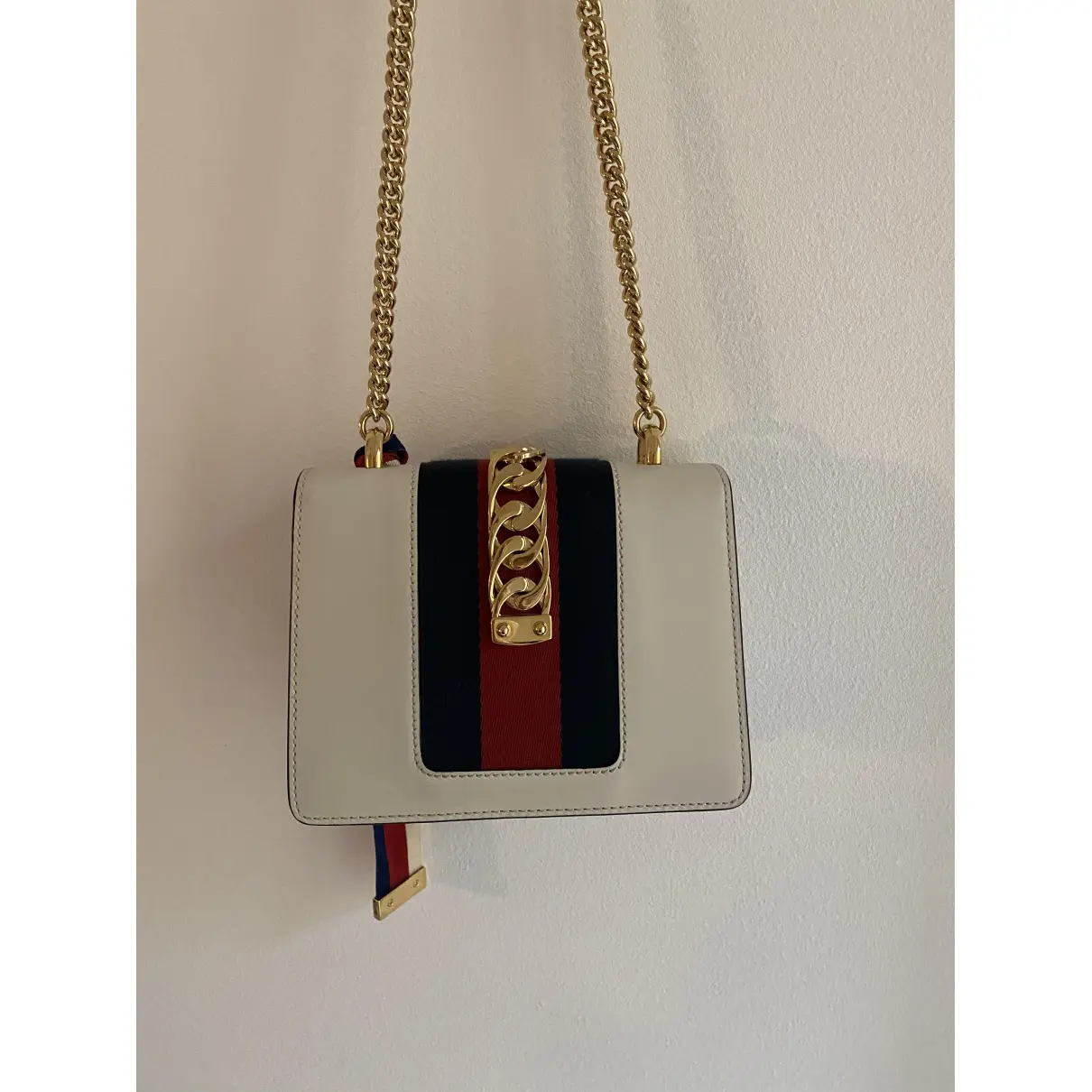 Buy Gucci Sylvie leather clutch bag online