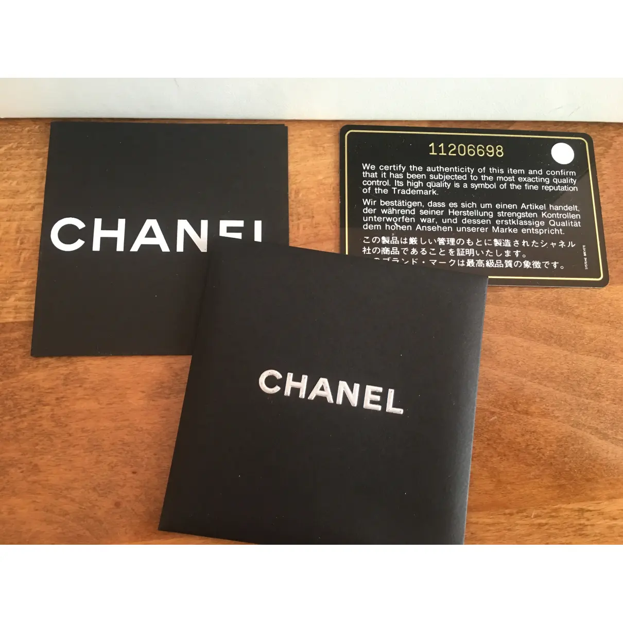 East West Chocolate Bar patent leather mini bag Chanel