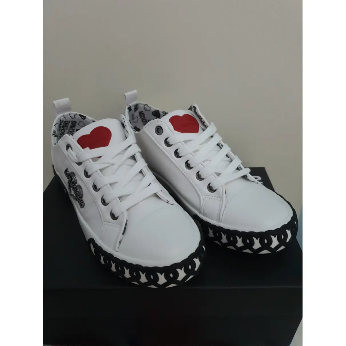 Buy Moschino Love Patent leather trainers online