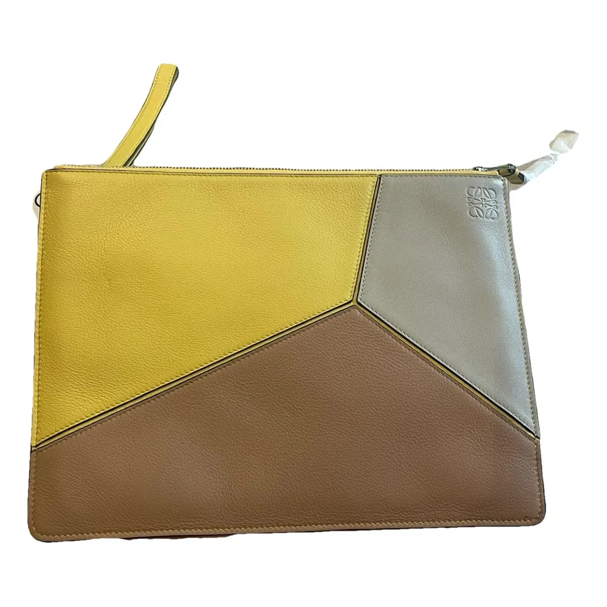 Puzzle leather clutch bag
