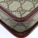 Interlocking cloth clutch bag Gucci