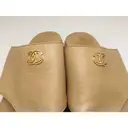 Leather flip flops Chanel