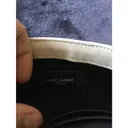 Buy Saint Laurent Loulou leather clutch bag online