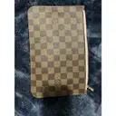 Buy Louis Vuitton Neverfull leather clutch bag online
