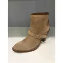 Saint Laurent Buckled boots for sale