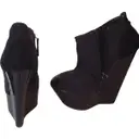 Buy Giuseppe Zanotti Black Ankle boots online