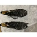 Buy Christian Louboutin Lou Spikes cloth trainers online